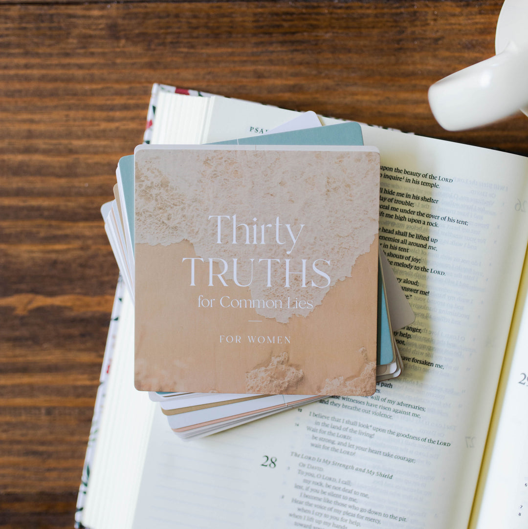 stack of cards on Bible 